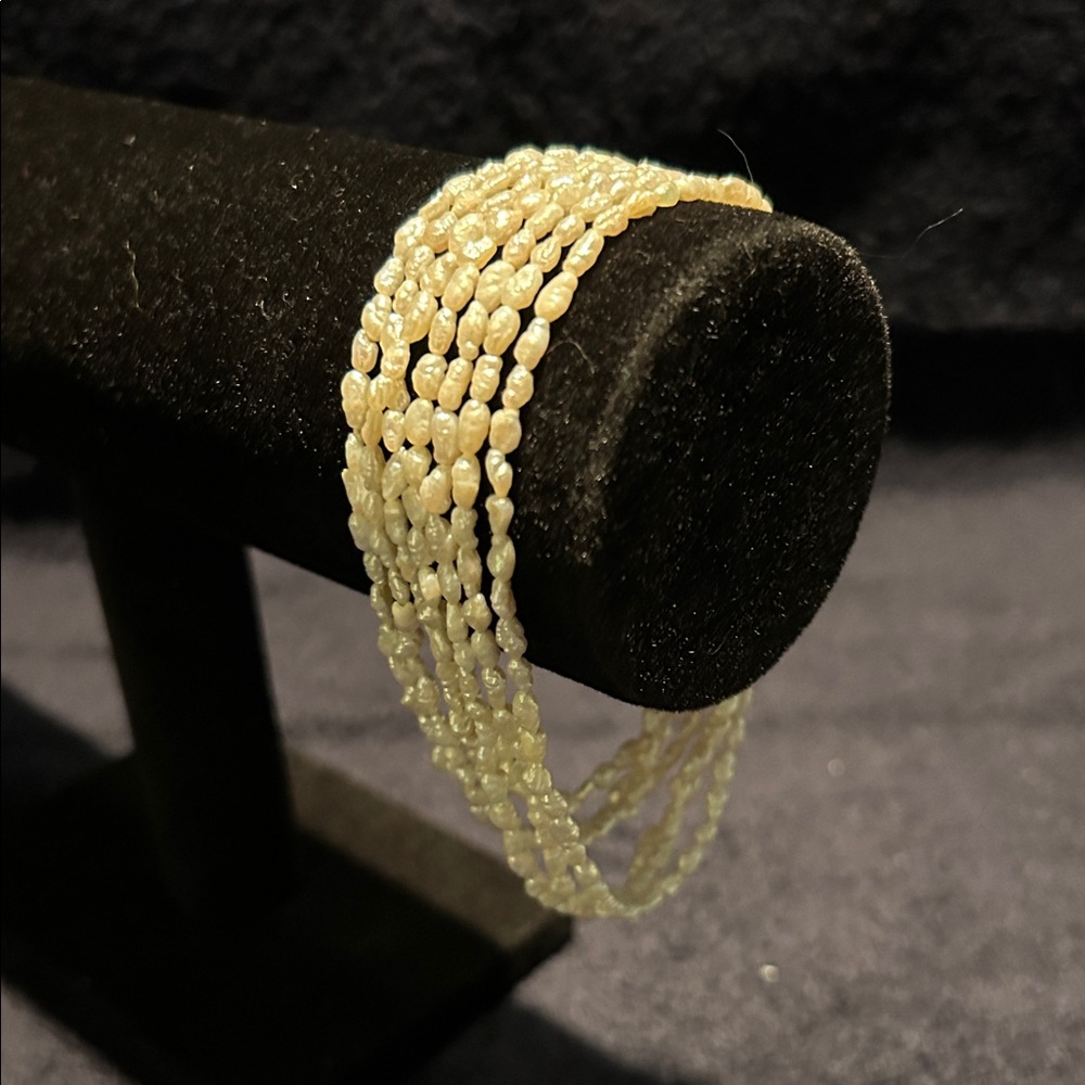 Bracelet, Small Fresh Water Pearls. Seven Strand with Slide In Clasp